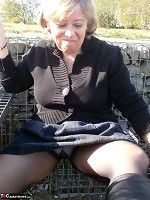 Caro-Stiff nipples and Bottle Fuck outdoors Pictures